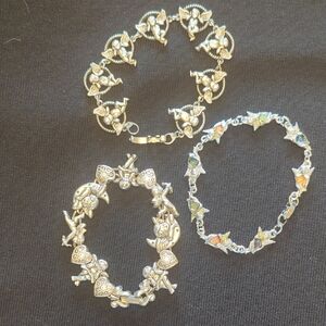 Silver Angel and Floral Charm Bracelets